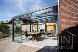Close aluminium veranda with glass side