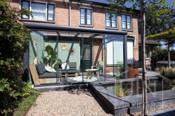 Modern garden room with glass sliding doors